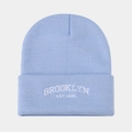 Detail of light blue knit beanie with Brooklyn Est 1631 white embroidery texture - Light Blue
