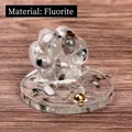 Cat paw figurine with purple and green fluorite crystals in resin on golden bead base - Fluorite