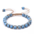 Detailed macro of a Bohemian square blue imperial stone woven bracelet with adjustable cord - Blue Textured Style (Style-5)