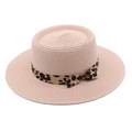 Detail of pink straw boater hat featuring a leopard print ribbon and side bow accent - M (56-58cm) / Pink