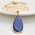 Golden necklace with teardrop-shaped blue lapis lazuli stone pendant for women - Long Water Drop