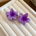 Close-up of two purple gradient sunflower hair claws on a white jewelry display pad - 92# Mini Hair Claws-Purple Flower (Pair)