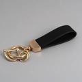 Elegant black suede leather car keychain with golden metal rings and anti-lost hardware - Gold/Black