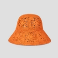 Macro detail of vibrant orange crochet sun hat showing intricate floral hollow knit patterns - M(56-58cm) / Orange