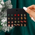 12-pair Christmas earring set featuring Santa, Reindeer and Merry motifs on display card - 12 Pairs/Set Snowflake Reindeer Candy Cane