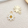 Front and back view of gold-plated flower charms with white and yellow enamel - Sunflower (11943)