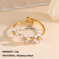 Adjustable golden stainless steel ring featuring three white beaded flowers - 923G-1 / White Flower