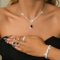 Luxury 4-piece jewelry set with black teardrop gemstones and cubic zirconia details - Four-Piece Set / Silver Black