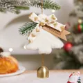 White faux fur Christmas tree ornament with a golden bell hanging on a festive branch - White Christmas Tree Bell