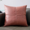 Brown leather throw pillow case with cross-stitch design on a luxury dark sofa - Vermilion Red