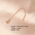 Rose gold adjustable extender chain with lobster clasp on pink satin background - Rose Gold Plated 3 Segments