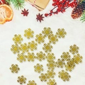 Close-up of golden glitter snowflake confetti on white faux fur with festive Christmas props - Gold Glitter Snowflake Confetti (ai-100 Pcs/Pack)