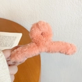 Fuzzy salmon pink plush hair claw clip for women, large winter accessory for thick hair - Orange Plush Hair Claw