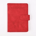 Front view of red RFID blocking PU leather passport holder with world map embossing - Red