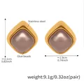Detail view of square gold stainless steel earrings with brown pearlescent glue beads - Gold