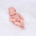 20cm reborn baby doll in pink polka dot knit outfit sleeping on a soft white plush rug - Purple Pink Polka Dot