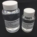 Close-up of 3:1 ratio crystal epoxy resin AB glue bottles for DIY craft casting - 400g AB Resin Set (300g+100g)