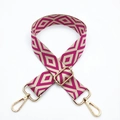 Detail of colorful geometric embroidery on a wide shoulder strap with golden metal clips - Rose Red