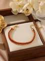 Détail du bracelet plaqué or 18 carats avec zircons rouges et fermoir mousqueton ajustable - 16.5-23cm / Or + Zircone Rouge (ZHB746红)