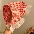 Pastel red checkered baby sun hat with delicate white lace trim in a vintage rural style - Red Plaid