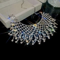 Macro detail of silver tassel choker necklace featuring shimmering crystal fringe - Silver Rhinestone Tassel Necklace Type 2