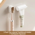 Wall-mounted electric toothbrush holder in amber tea color with white toothpaste dispenser - Transparent Amber + Squeezer