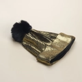 Women's gold metallic knit beanie with a black faux fur pom-pom for winter wear - Gold