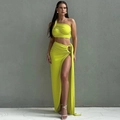 Detail of neon green one-shoulder crop top and high slit skirt set in knit fabric - S / Yellow-Green