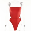 Detail view of red one-piece swimsuit featuring side cut-outs and slim shoulder straps - S / Orange
