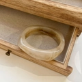 Detailed texture of amber marble resin bangle inside a wooden jewelry drawer - Inner Diameter 66mm / Light Coffee