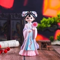 Traditional Chinese girl figurine in blue and pink hanfu holding a plum blossom fan - Large Fan Style