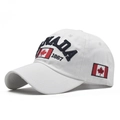 White cotton CANADA 1867 baseball cap with red maple leaf embroidery shown from 45-degree angle - Adjustable / Cotton White