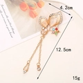 Detailed view of leaf-shaped rhinestone charm with tassel chains, size 4.2cm by 12.5cm - D562 Flower Tassel