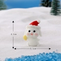 Mini-Weihnachtshase aus Harz mit Weihnachtsmütze und gelbem Stern als Deko-Figur - Nr. 3 Weihnachtsmütze Winkend