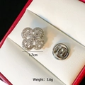 Macro shot of a silver clover brooch with rhinestones showing 1.7cm size and 3.6g weight - Silver Clover D019