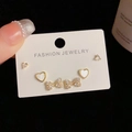 Macro view of S925 silver stud earring set with heart and bow-knot zircon charms - Gold-Rhinestone Bow Heart Set (42#)