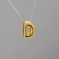 Polished gold plated letter D bubble pendant necklace with minimalist metallic finish - Letter D
