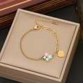 Golden Evil Eye bracelet with colorful clover pendants displayed on a jewelry box - Four-leaf Clover Evil Eye Style (2#)