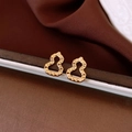 Macro shot of gold gourd stud earrings featuring hollow diamond-cut texture and gloss - 58# 925 Sterling Silver Earring Post-Gold Hollow Carved Gourd Stud Earrings