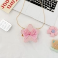 Sac enfant rose en forme d'étoile avec perles, nœud en résille et chaîne dorée - Nœud Rose