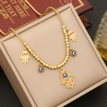 Gouden slangenschakelketting met Hamsa hand en boze oog bedels in een sieradendoos - 1# Ketting
