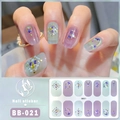 Detalle del adhesivo de uñas 5D BB-021 con base cian claro y elementos de oro fino - Estrella Luna Oro Verde / Estilo BB021