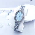 Close-up of a ladies quartz watch with sea blue sunray dial and rhinestone bezel - Silver Sky Blue