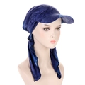 Detail of navy blue tie-dye turban hat with brim and long side straps on white background - Tie-dye Royal Blue