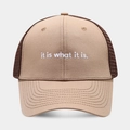Close-up of the breathable mesh back and white 'it is what it is' embroidery on the trucker hat - Adjustable / Khaki with Coffee Mesh