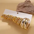 Set di 10 paia di orecchini a cerchio dorati a forma di C su cartoncino display - Set da 20 Pezzi (Oro)