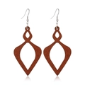 Macro detail of rhombus hollowed dark brown wood earrings with metal hooks and natural grain - Style 58