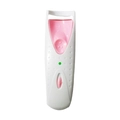 Electric eyelash curler with white and pink finish featuring heated pad and indicator light - Pink