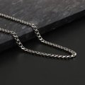 Polished silver stainless steel Cuban link chain necklace on dark marble background - 5mm * 45cm