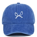 Close-up of white bow embroidery on washed navy cotton baseball cap with vintage texture - Adjustable / Sapphire Blue